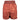 Back view of women’s shorts with a tie-dye pattern in shades of red and a solid waistband.