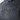 Close up of a black hoodie with a, embossed bass cat logo on the chest.
